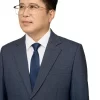 Cận cảnh ve áo và bề mặt vải tuýt si của vest nam trung niên HG107 màu xanh than