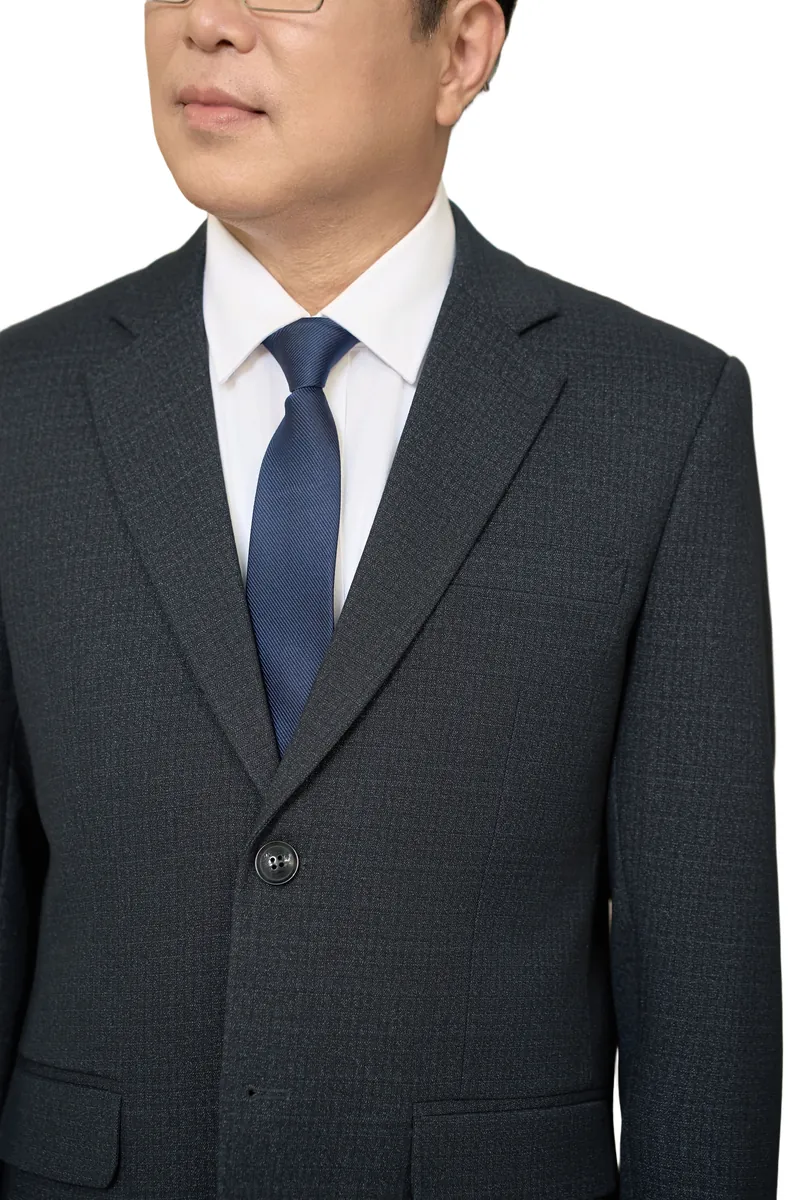 Cận cảnh ve áo và bề mặt vải tuýt si của vest nam trung niên HG123 Cận cảnh ve áo và bề mặt vải tuýt si của vest nam trung niên HG123
